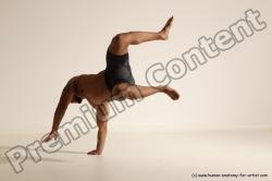 Underwear Gymnastic poses Man Black Muscular Bald Dancing Dynamic poses Academic